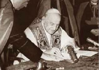 Le pape Jean XXIII signe l'encyclique