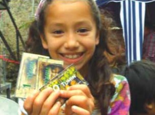 Enfant avec billet Tumin